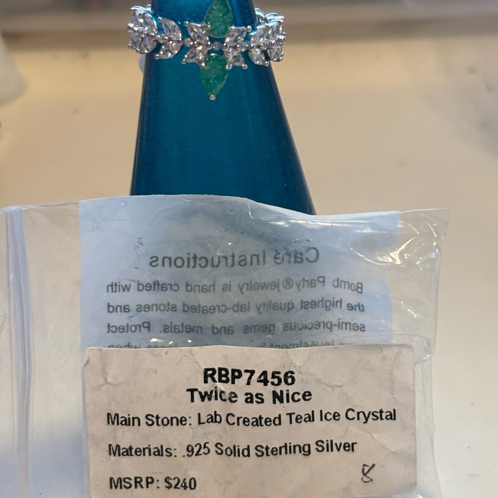 Sterling Silver Ring with Teal and Silver Accents